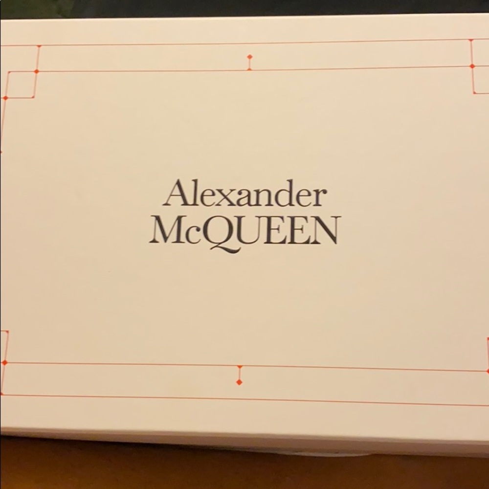 BRAND NEW! NEVER WORN....  Alexander McQueens